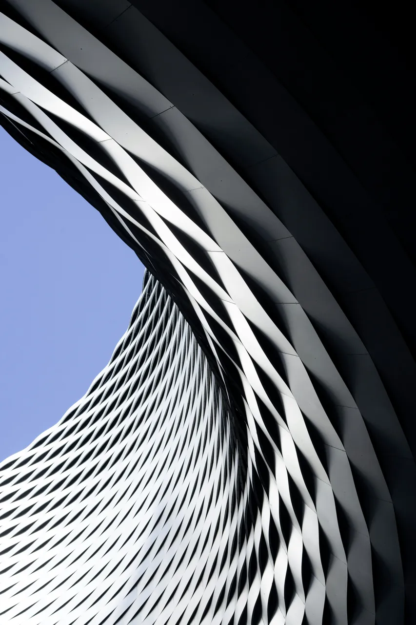 The woven metal facade of Messe Basel — two layers that interlock